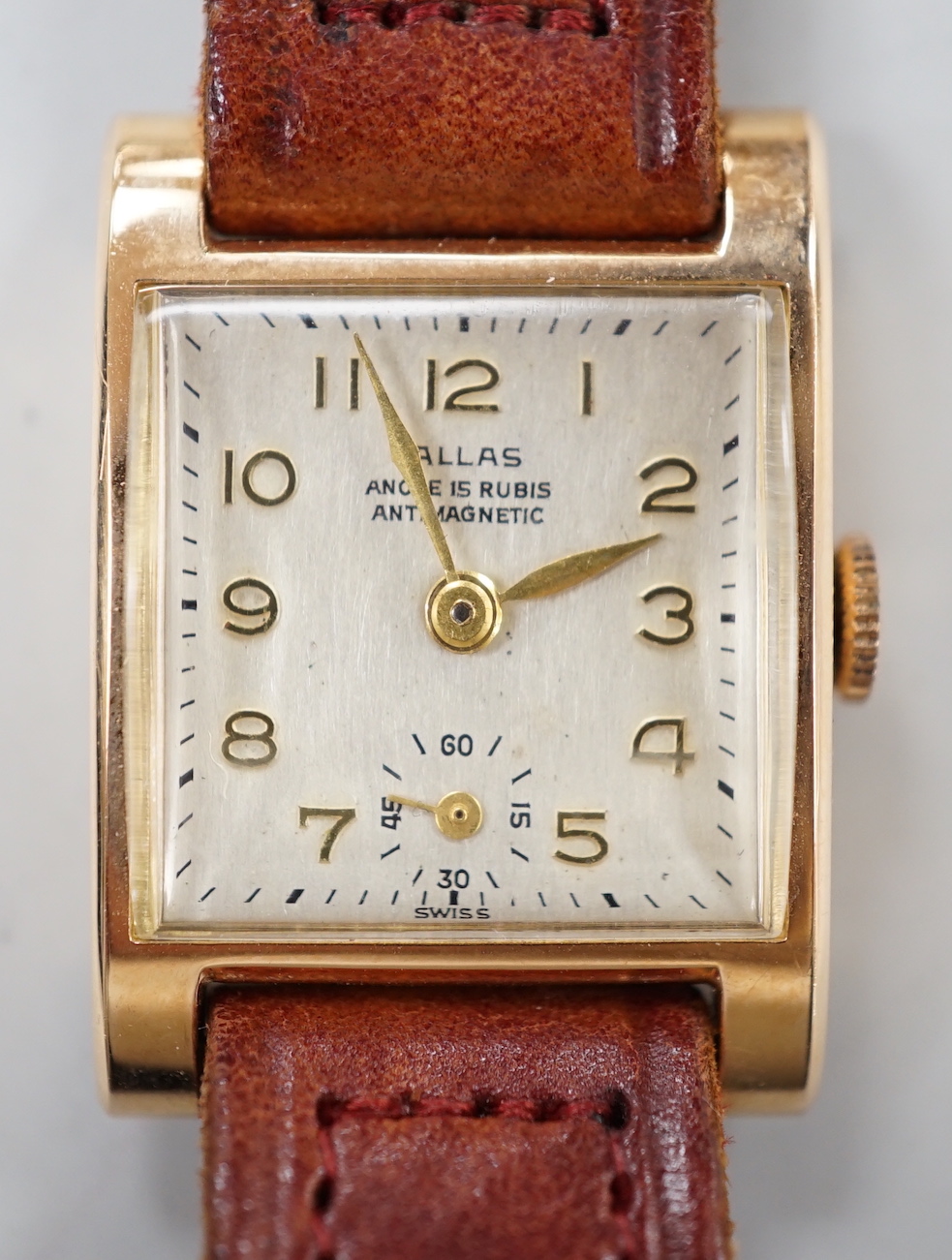 A lady's 18k Pallas manual wind wrist watch, on a leather strap, case diameter 21mm.